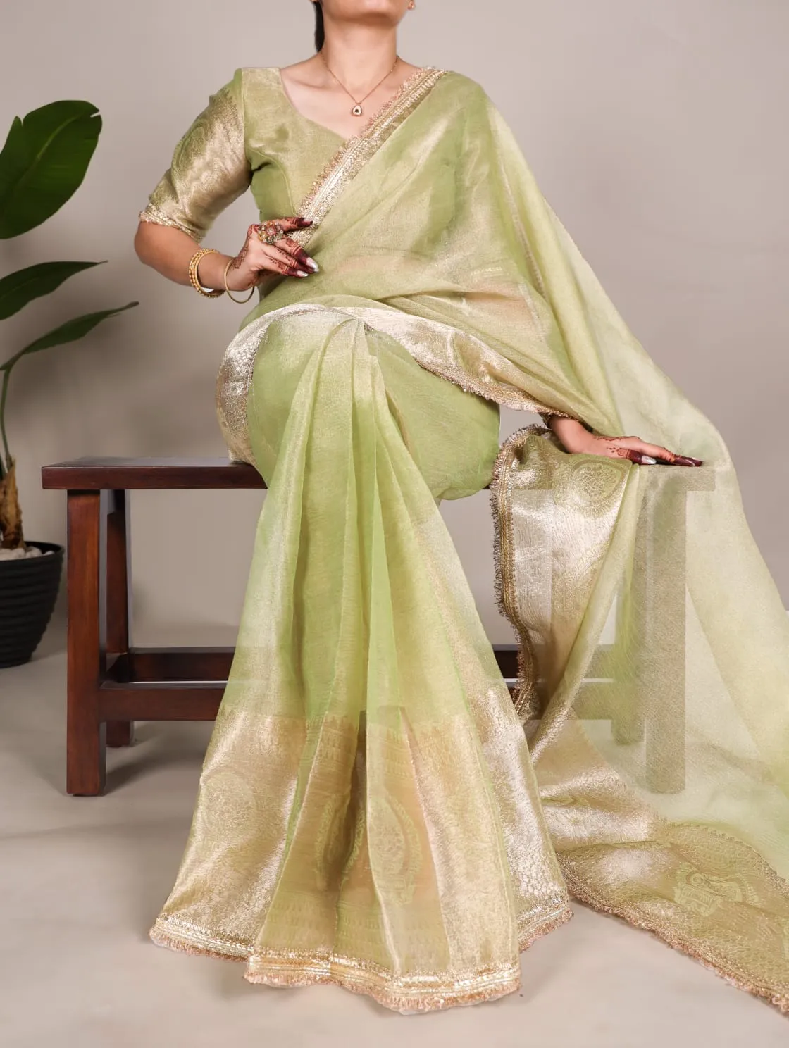 Pista Tissue Shimmer Zari Weaving Work Tissue Saree