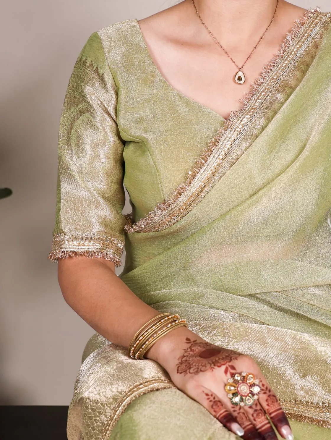 Pista Tissue Shimmer Zari Weaving Work Tissue Saree